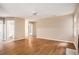 Spacious living room with wood-look floors and bright lighting at 273 Apalachee Church Rd, Auburn, GA 30011