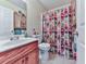 Bathroom with vanity, mirror, toilet, shower and storage at 504 Hillcrest Cross Rd, Canton, GA 30115
