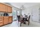 Cozy breakfast nook with natural light and easy access to the backyard at 504 Hillcrest Cross Rd, Canton, GA 30115
