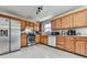 Functional kitchen with stainless steel appliances, ample cabinet space, and a bright window at 504 Hillcrest Cross Rd, Canton, GA 30115