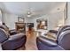 Cozy living room with hardwood floors, a fireplace, and comfortable leather seating at 504 Hillcrest Cross Rd, Canton, GA 30115