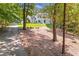 Elegant home with well-manicured landscaping and a long driveway at 5145 Saddlebred Ln, Cumming, GA 30028