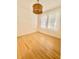 Cozy bedroom with windows providing lots of natural light and beautiful hardwood floors at 2230 Peachtree Road Nw Rd # A4, Atlanta, GA 30309