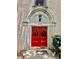 Charming building entrance with a bright red double-door, stone archway, and decorative details at 2230 Peachtree Road Nw Rd # A4, Atlanta, GA 30309