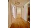 Hallway with hardwood floors that leads to a bathroom and a bedroom at 2230 Peachtree Road Nw Rd # A4, Atlanta, GA 30309