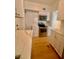 Modern kitchen with stainless steel appliances, white cabinets, and elegant countertop at 2230 Peachtree Road Nw Rd # A4, Atlanta, GA 30309