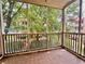 Covered patio with tile flooring and screened enclosure offering outdoor living space at 2230 Peachtree Road Nw Rd # A4, Atlanta, GA 30309