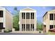 Elegant new construction building with a neutral color palette and symmetrical facade at 235 Rolison Way, Fayetteville, GA 30214