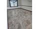 Bedroom with decorative tile flooring and a large window providing natural light at 2752 Inverloch Cir, Duluth, GA 30096