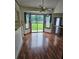 Dining area with hardwood floors and sliding glass doors leading to the backyard at 2752 Inverloch Cir, Duluth, GA 30096