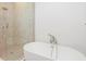 Modern bath with a freestanding tub and separate shower at 675 Drewry Ne St # 205, Atlanta, GA 30306