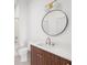 Contemporary bathroom with a round mirror, sink and toilet at 675 Drewry Ne St # 205, Atlanta, GA 30306