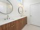 Modern bathroom featuring double sinks and stylish wood cabinets at 675 Drewry Ne St # 205, Atlanta, GA 30306