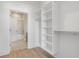Walk-in closet with shelving and a bathroom view at 675 Drewry Ne St # 205, Atlanta, GA 30306