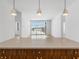 Bright kitchen island view into the living space with windows at 675 Drewry Ne St # 205, Atlanta, GA 30306