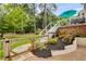 Beautiful backyard features a spacious deck and mature landscaping at 225 Carriage Station Cir, Roswell, GA 30075
