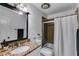 Updated bathroom with granite countertop and shower-tub combination at 225 Carriage Station Cir, Roswell, GA 30075