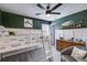 Modern bedroom with bunkbeds, ceiling fan, and playful décor at 225 Carriage Station Cir, Roswell, GA 30075