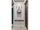 Charming entryway with shiplap wall and brick floors at 225 Carriage Station Cir, Roswell, GA 30075