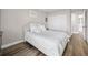 Bedroom with a double-door closet and hardwood floors at 375 Ralph Mcgill Ne Blvd # 707, Atlanta, GA 30312