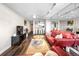 Living room with modern furniture, open to kitchen area, and hardwood floors at 375 Ralph Mcgill Ne Blvd # 707, Atlanta, GA 30312