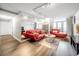 Spacious living room featuring a mirrored wall and view of the balcony at 375 Ralph Mcgill Ne Blvd # 707, Atlanta, GA 30312
