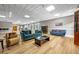 Community lounge with couches, tables, and chairs at 375 Ralph Mcgill Ne Blvd # 707, Atlanta, GA 30312