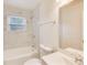 Bathroom featuring tile backsplash, shower over tub, and vanity with sink at 500 Pomoma Circle Sw, Atlanta, GA 30315