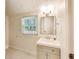 Bright bathroom featuring a sink and mirror at 500 Pomoma Circle Sw, Atlanta, GA 30315