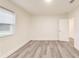 Bedroom with light gray wood-look flooring and a bright window at 500 Pomoma Circle Sw, Atlanta, GA 30315