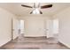 Large bedroom with new floors, fresh white paint, and a ceiling fan at 500 Pomoma Circle Sw, Atlanta, GA 30315
