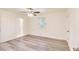 Bright bedroom with new floors, fresh white paint, and a ceiling fan at 500 Pomoma Circle Sw, Atlanta, GA 30315