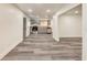 Open kitchen featuring gray cabinetry, stainless steel appliances, and modern gray vinyl flooring at 500 Pomoma Circle Sw, Atlanta, GA 30315