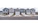 Charming row of townhomes displaying a variety of stylish exterior finishes and well-maintained curb appeal at 6011 Pine Bluff Pl, Conyers, GA 30013