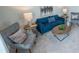 Well-lit living room offers comfortable seating arrangements and stylish décor at 6011 Pine Bluff Pl, Conyers, GA 30013