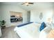 Spacious main bedroom features a ceiling fan, large closet, and an ensuite sitting room at 6011 Pine Bluff Pl, Conyers, GA 30013