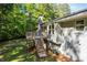 Cozy back deck providing a relaxing outdoor space with scenic views of the surrounding greenery at 6133 Post Rd, Douglasville, GA 30135