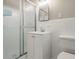 Bathroom with glass enclosed shower and white vanity at 6133 Post Rd, Douglasville, GA 30135