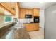 Eat-in kitchen with granite counters, stainless appliances, and a breakfast bar at 6133 Post Rd, Douglasville, GA 30135