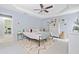Bright primary bedroom boasts tray ceilings, soft carpet, and ample natural light at 701 Robert Ln, Canton, GA 30114