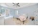 Cozy primary bedroom with tray ceilings and ensuite bathroom at 701 Robert Ln, Canton, GA 30114