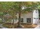 A charming two-story home with a white siding and attached two-car garage at 701 Robert Ln, Canton, GA 30114