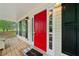 A red front door with black shutters and white trim at 701 Robert Ln, Canton, GA 30114