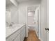 Bathroom featuring double vanity with bright mirror and a shower/bathtub combo at 777 Ruddy Drive (Lot20), Grayson, GA 30017