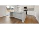 A well-appointed kitchen island offers ample counter space and storage at 777 Ruddy Drive (Lot20), Grayson, GA 30017