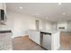 Modern kitchen with granite countertops, stainless appliances, and recessed lighting at 777 Ruddy Drive (Lot20), Grayson, GA 30017