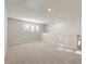 Spacious loft area with neutral carpet and abundant natural light at 777 Ruddy Drive (Lot20), Grayson, GA 30017