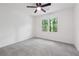 Cozy bedroom with a ceiling fan and ample natural light from a large window at 2863 Landing Dr, Marietta, GA 30066