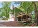 Multi-level home with large decks surrounded by mature trees at 2863 Landing Dr, Marietta, GA 30066