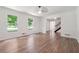 Bright living room with hardwood floors, crown molding, and staircase views at 2863 Landing Dr, Marietta, GA 30066